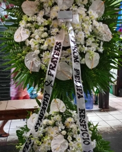 White roses, Anthuriums, mums & orchids Arrangement